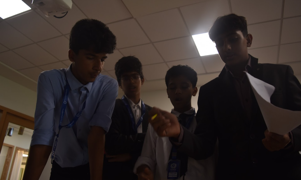 Delegates collaborating within a bloc during unmoderated caucus
