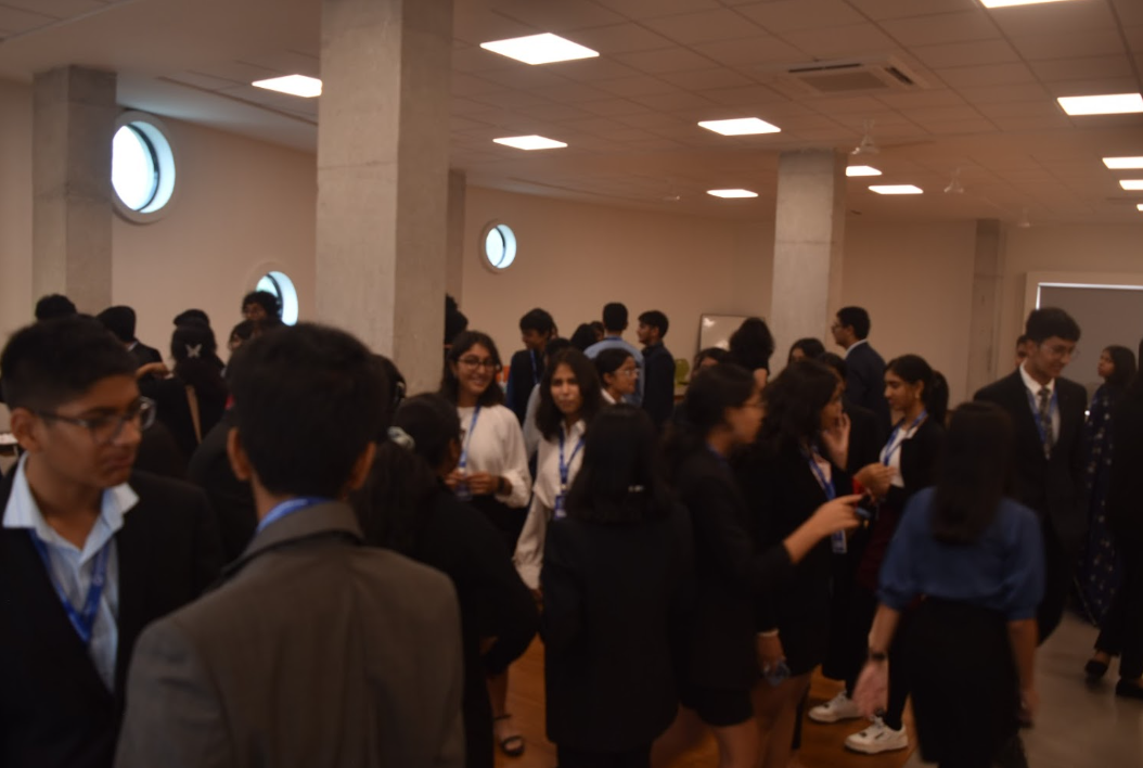 Delegates networking in the conference foyer